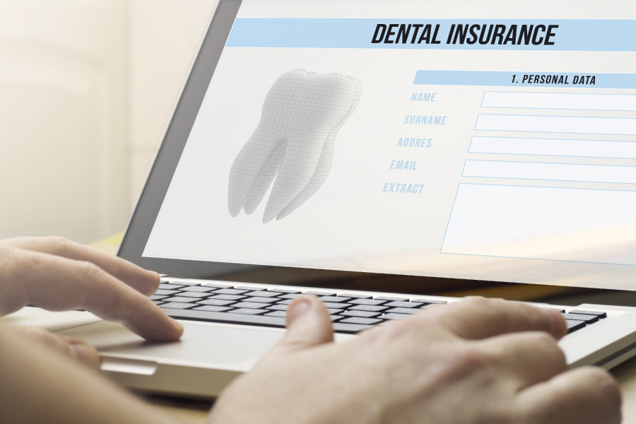 reviewing dental insurance benefits on a computer screen