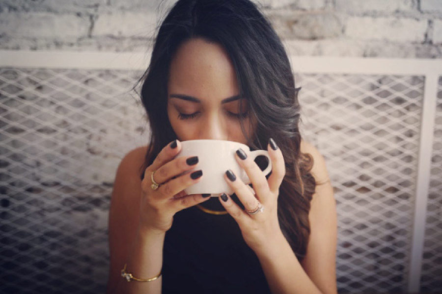 young woman drinking coffee