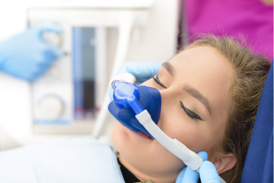 woman undergoes sedation dentistry to deal with anxiety